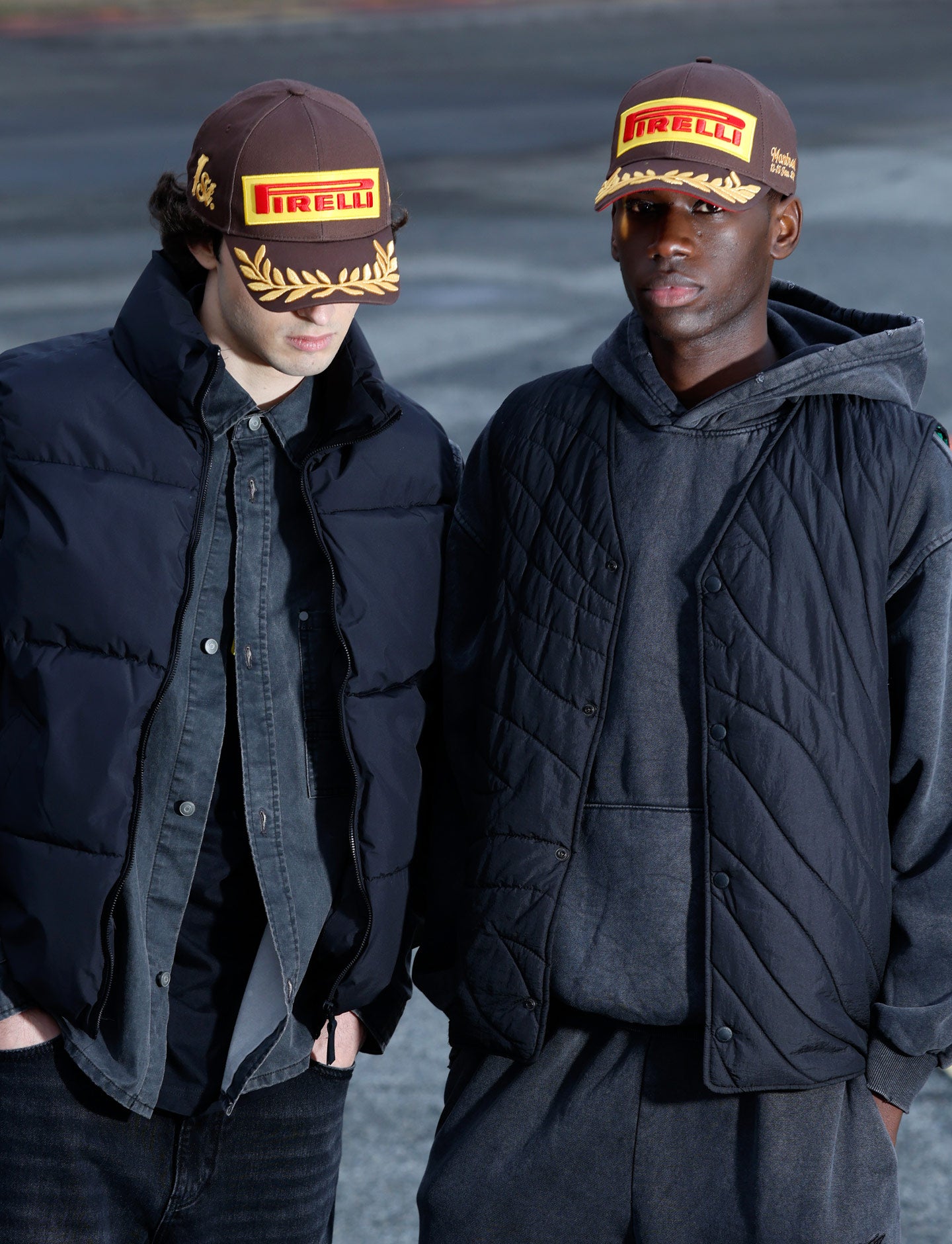 two men in Brown Pirelli Podium Caps