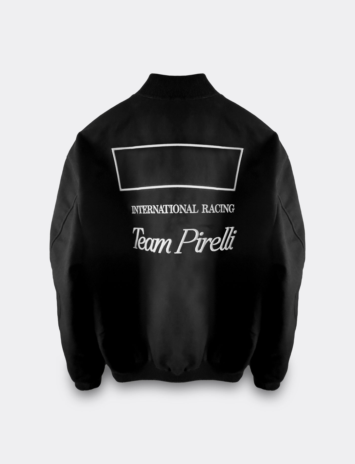 Black jacket with 'Team Pirelli' text on a white background
