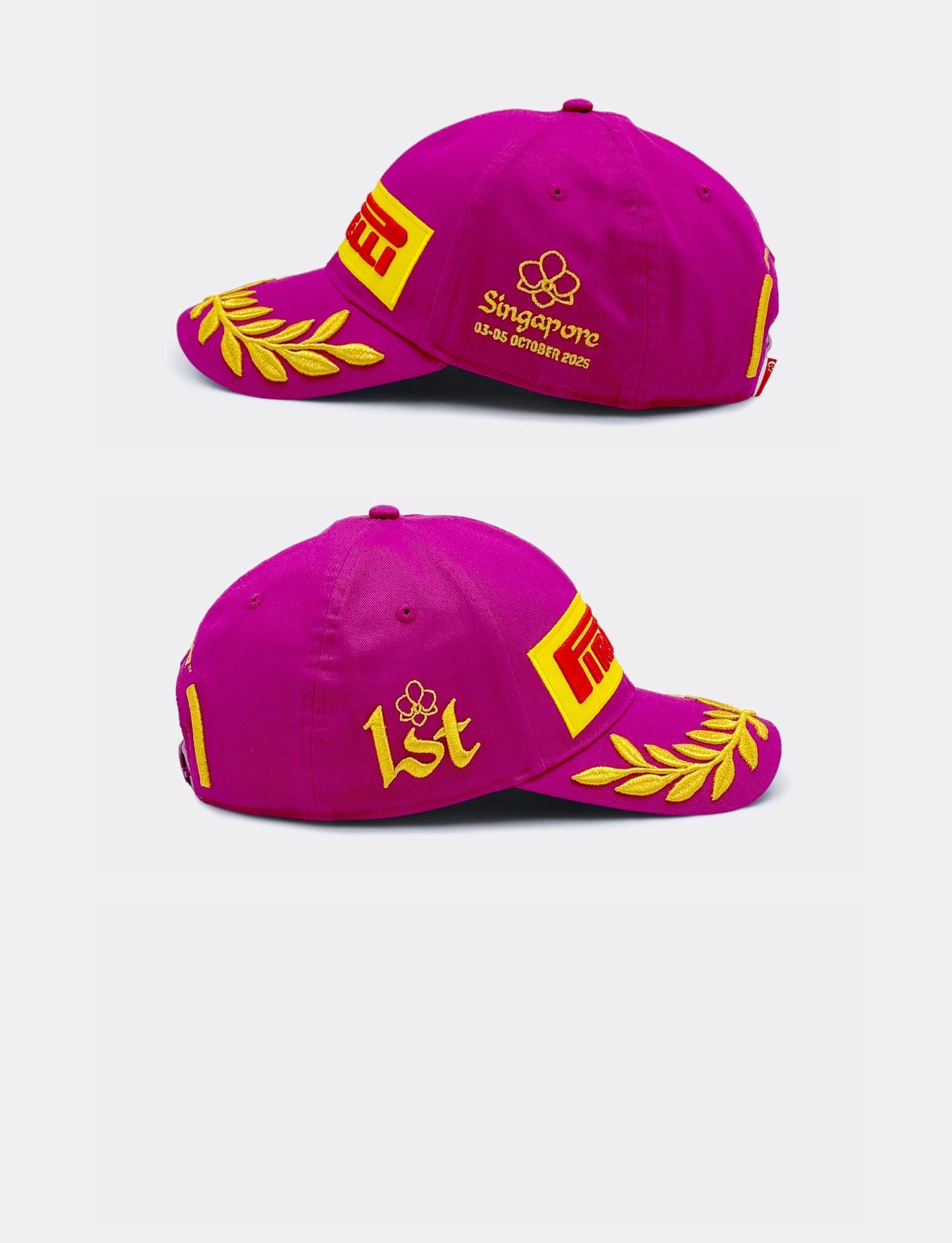 Two magenta Pirelli baseball caps with yellow and red accents on a white background