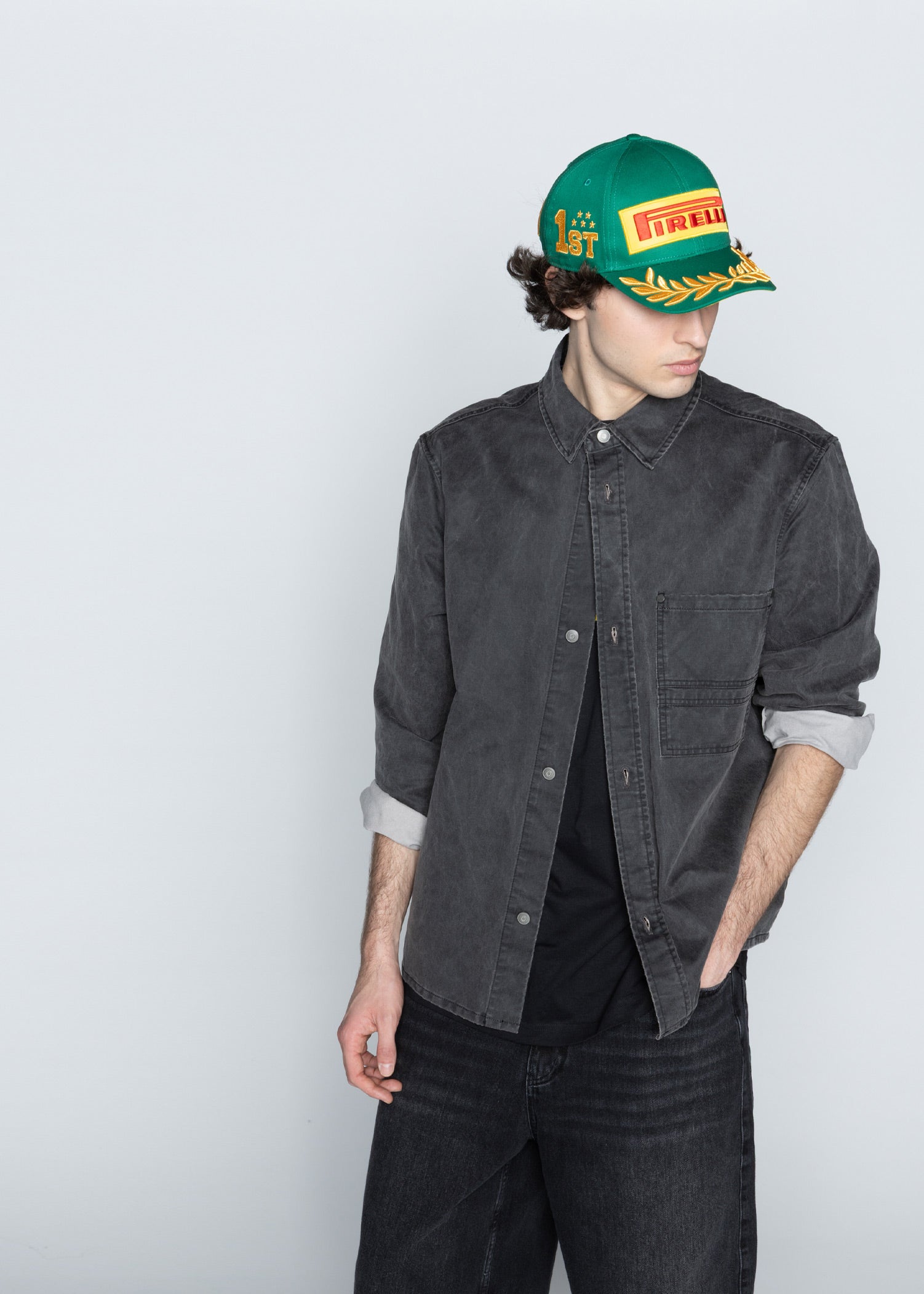 man in green Pirelli Podium Cap