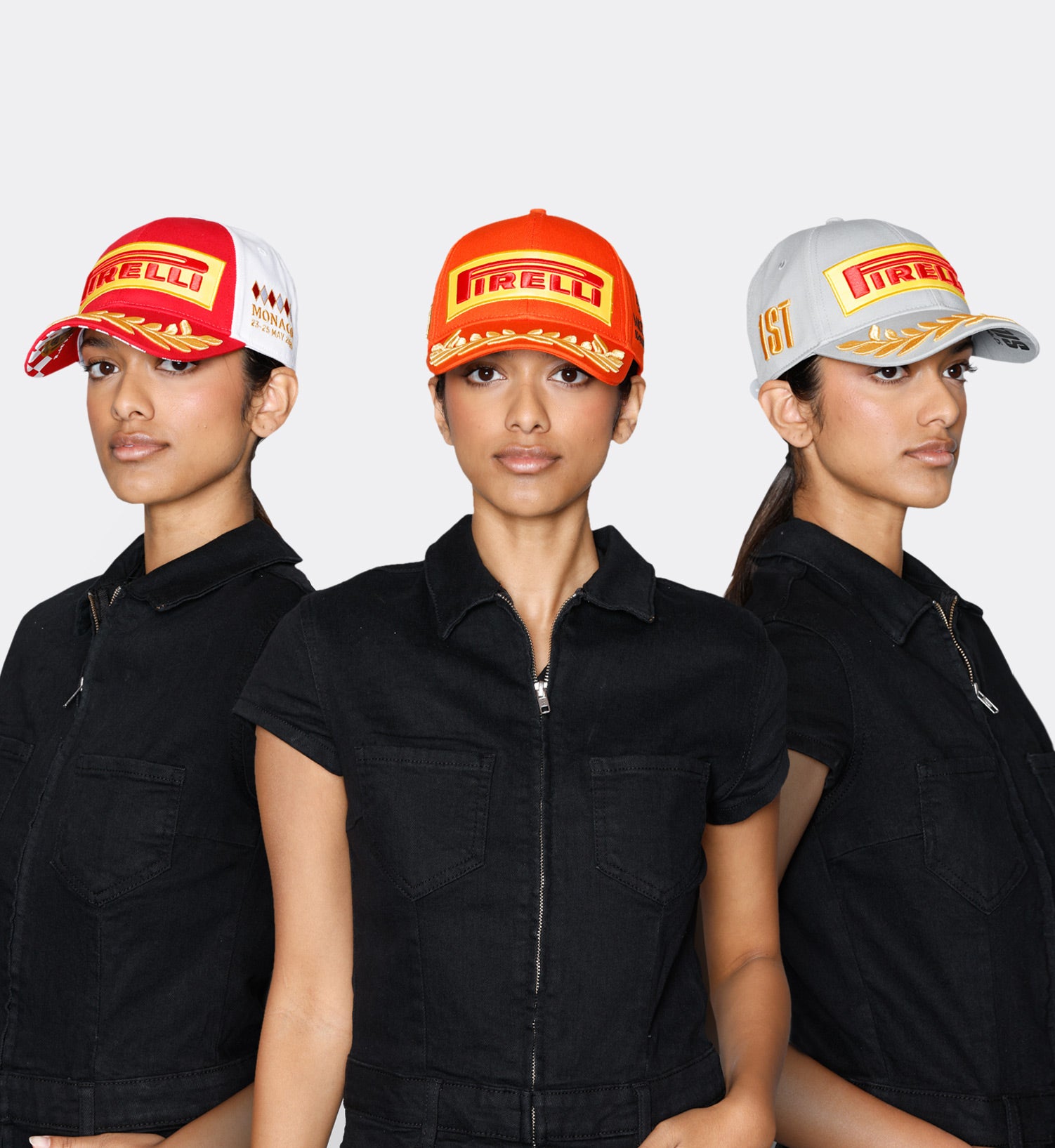 Woman wearing Pirelli-branded hats against a white background
