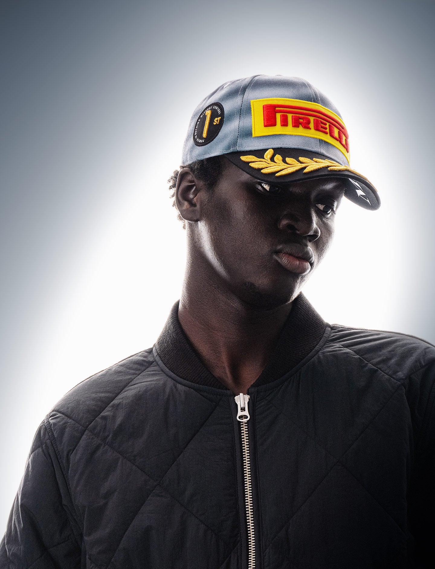 Person wearing an F1® Pirelli Podium Cap 2026 Miami