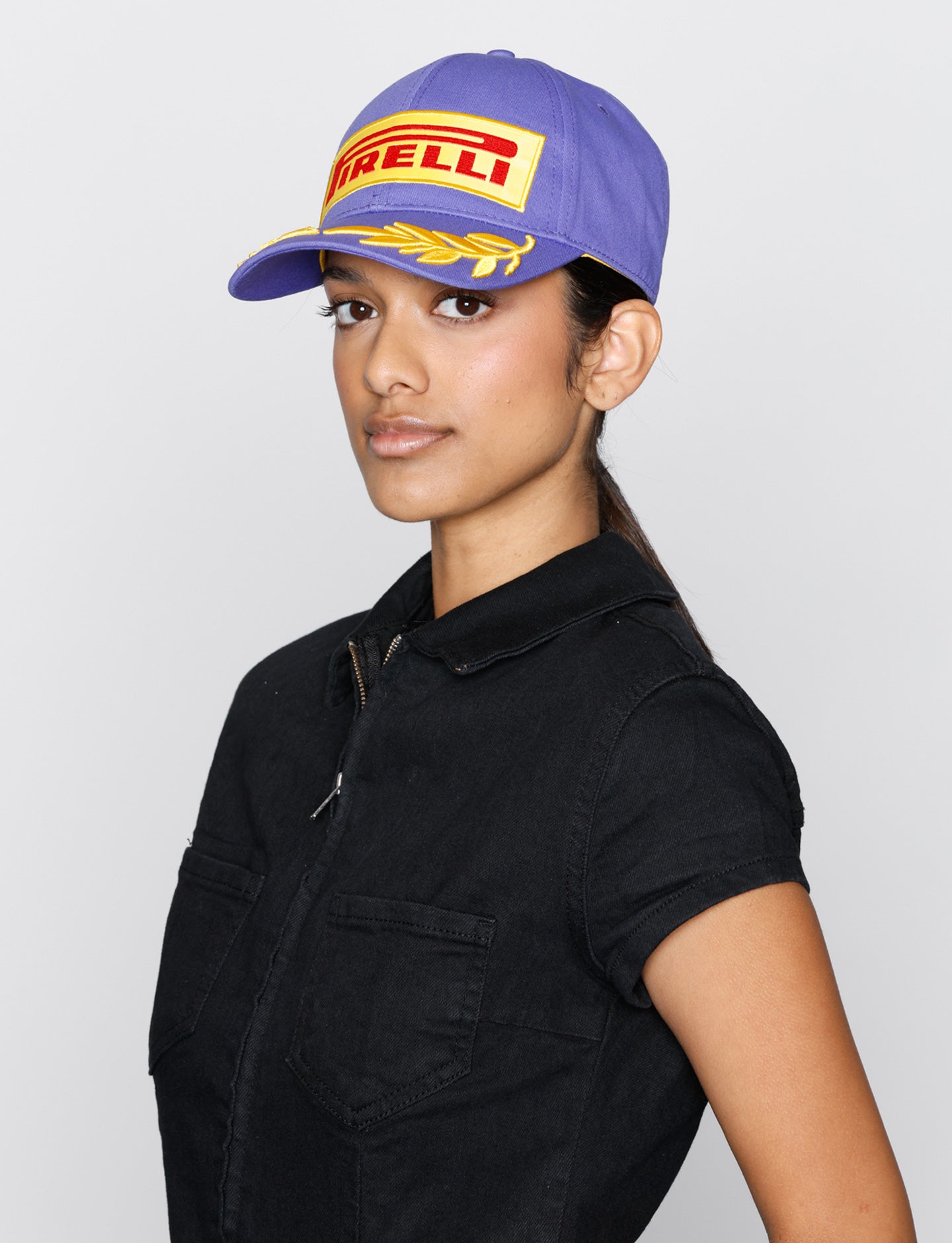 woman in purple Pirelli Podium Cap