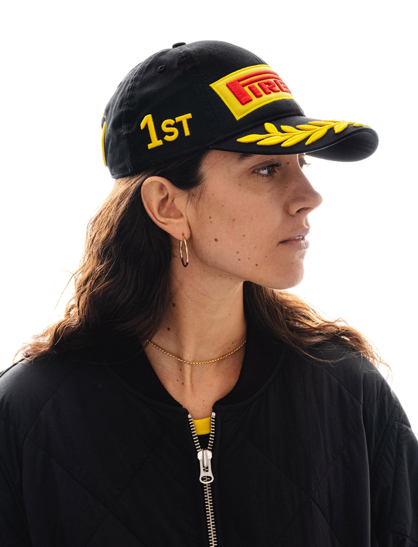 Person wearing F1® Pirelli Podium Cap