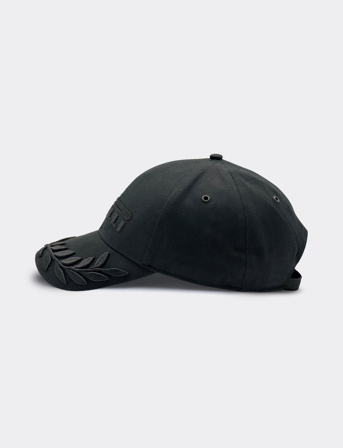 Black cap with a Pirelli logo on a light gray background