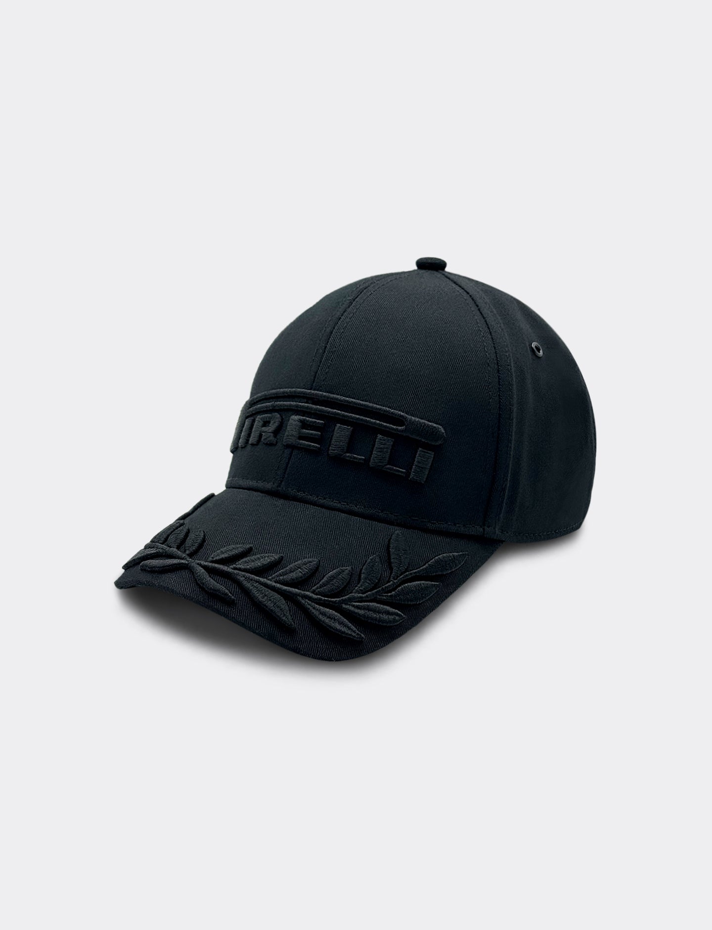 Black cap with a Pirelli logo on a light gray background