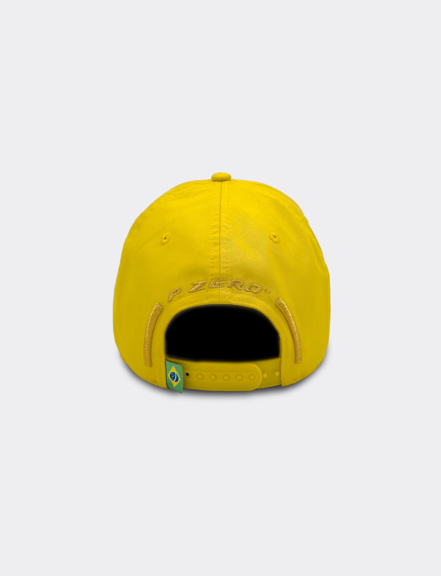 Yellow cap with brand logo on a light gray background