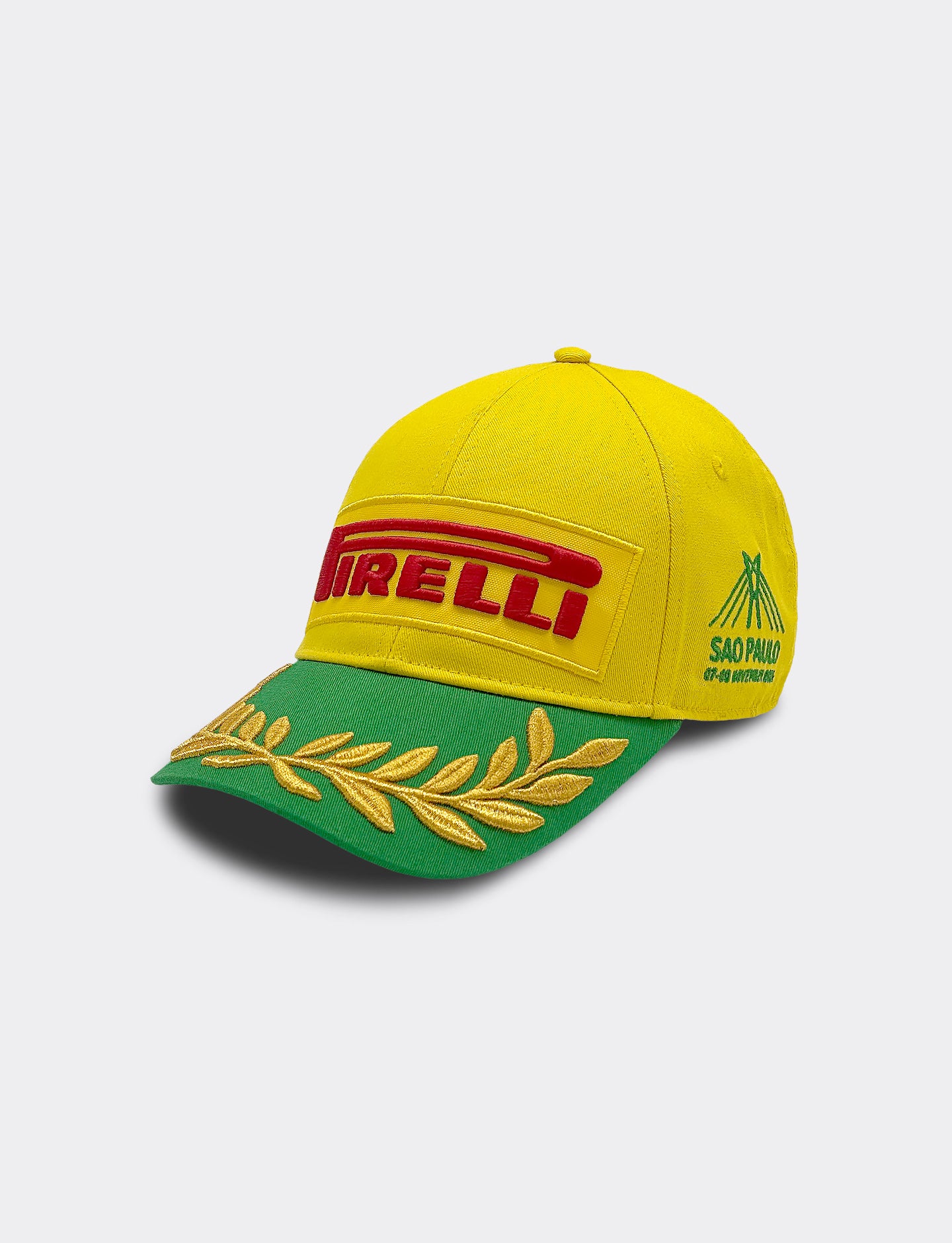 Yellow cap with red and green accents featuring Pirelli logo on a light gray background