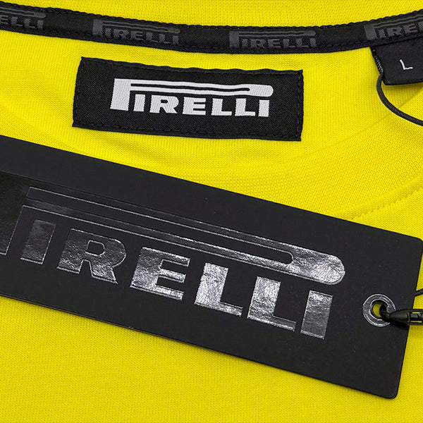 Close-up of a yellow garment with Pirelli branding on labels.
