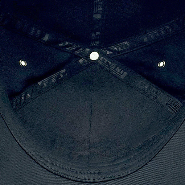 Interior of black on black Pirelli cap