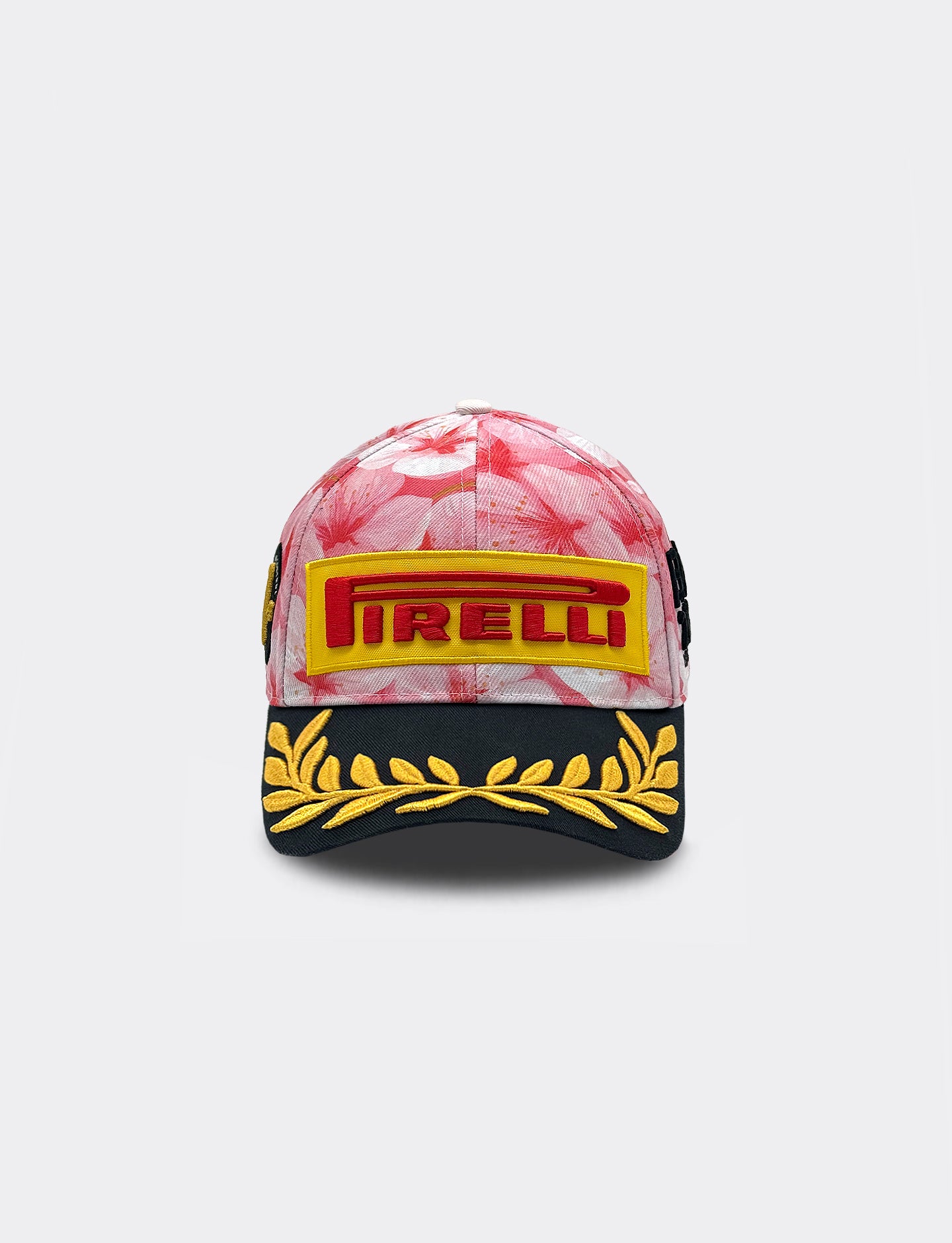 Pirelli Podium Cap with pink floral design on a light gray background