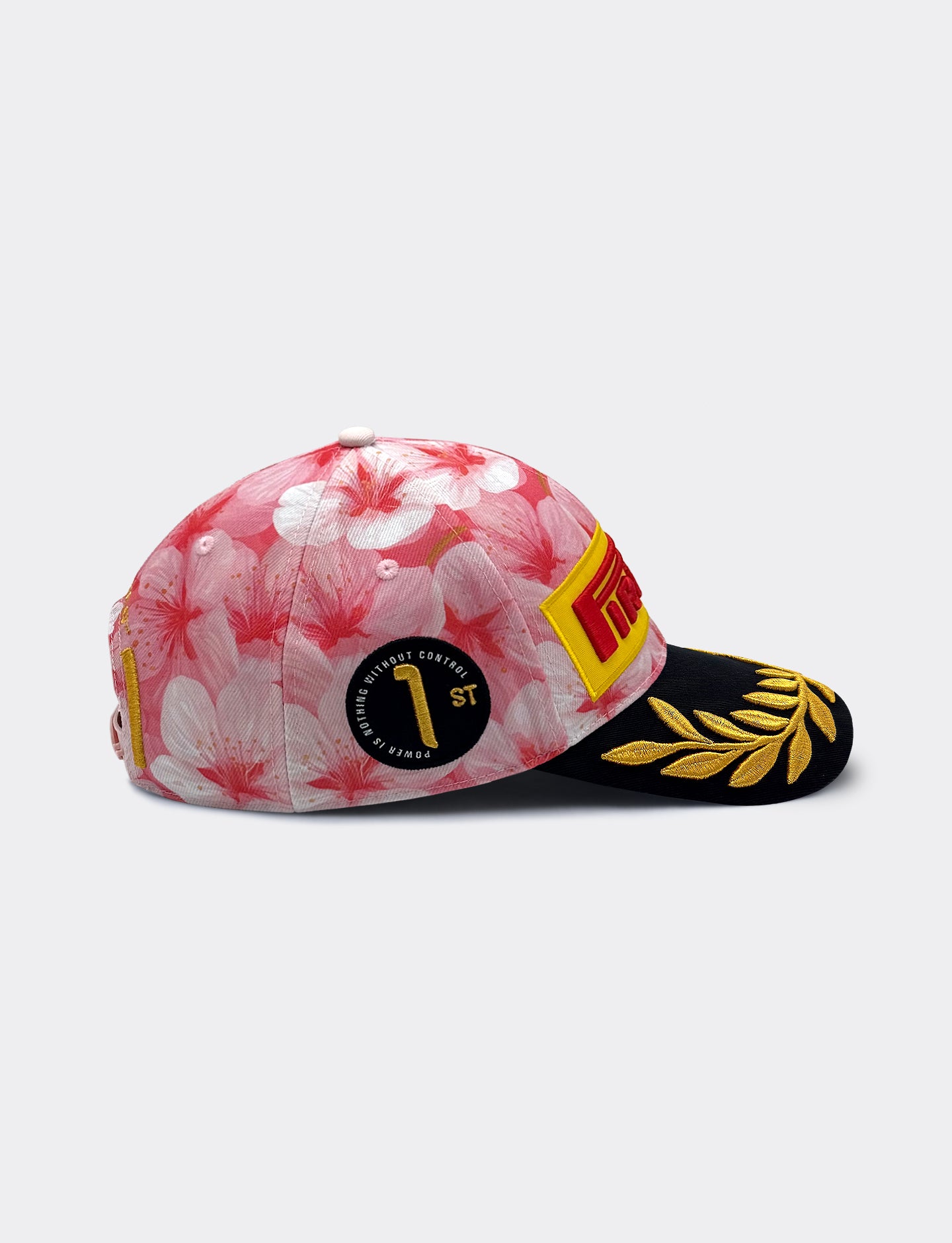 Pirelli Podium Cap with pink floral design on a light gray background