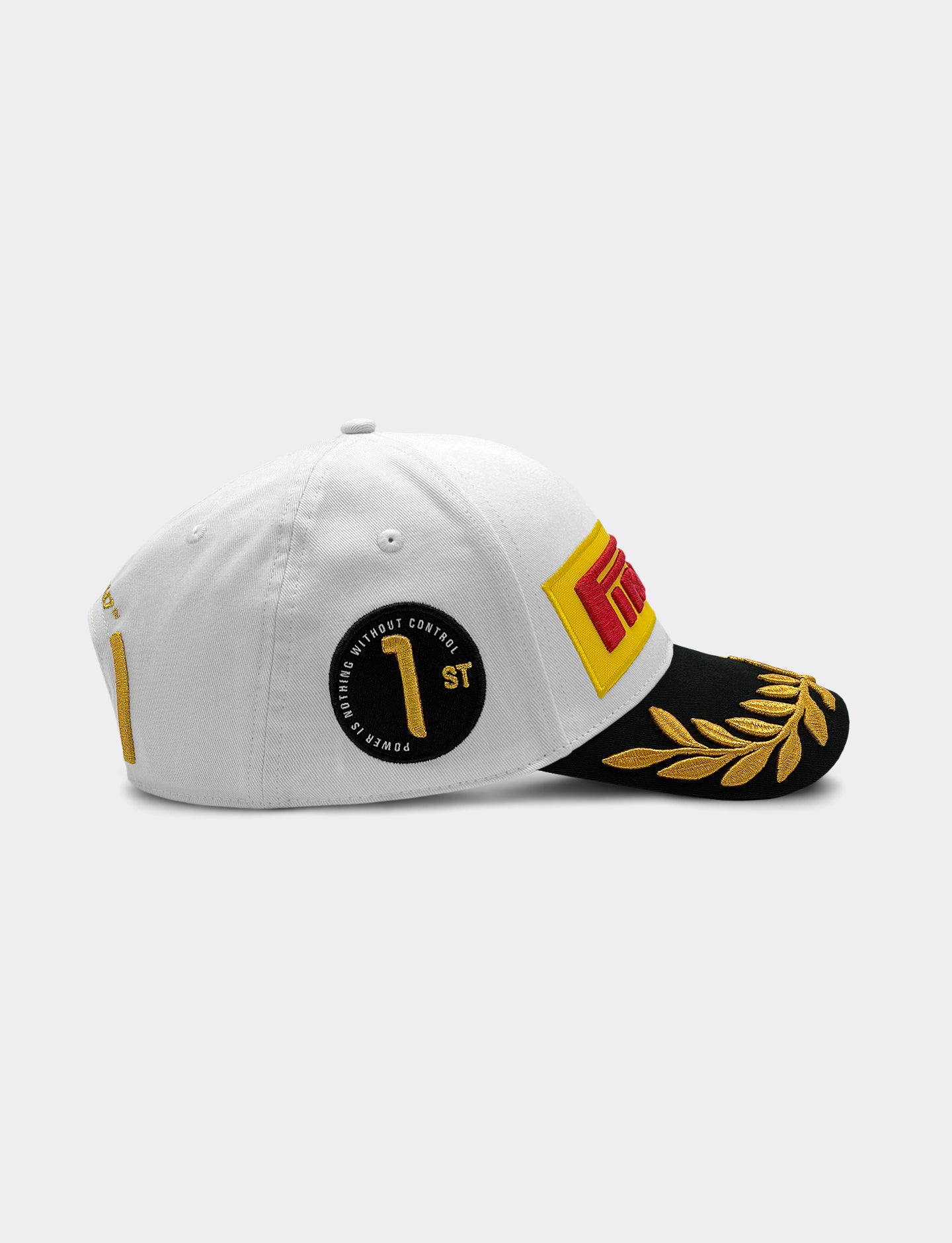 Pirelli Podium Cap 2026 Madrid - right view, white cap with black visor with gold laurel embroidery. '1 ST POWER WITHOUT CONTROL" patch embroidered in black on right panel