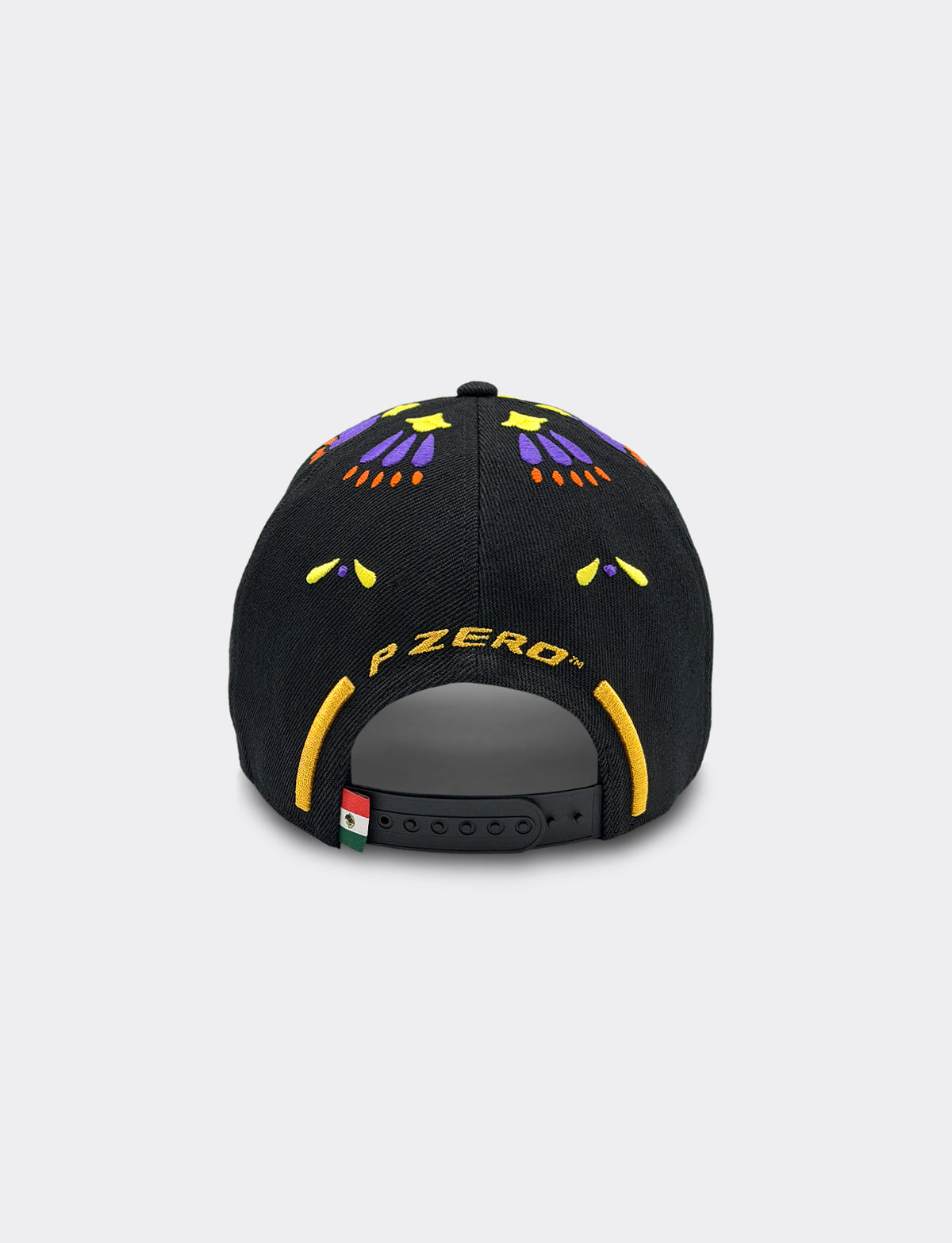 Black snapback cap shown from the back, featuring yellow embroidered 'P ZERO' text, yellow and purple geometric patterns on the crown, and yellow trim around the back strap.
