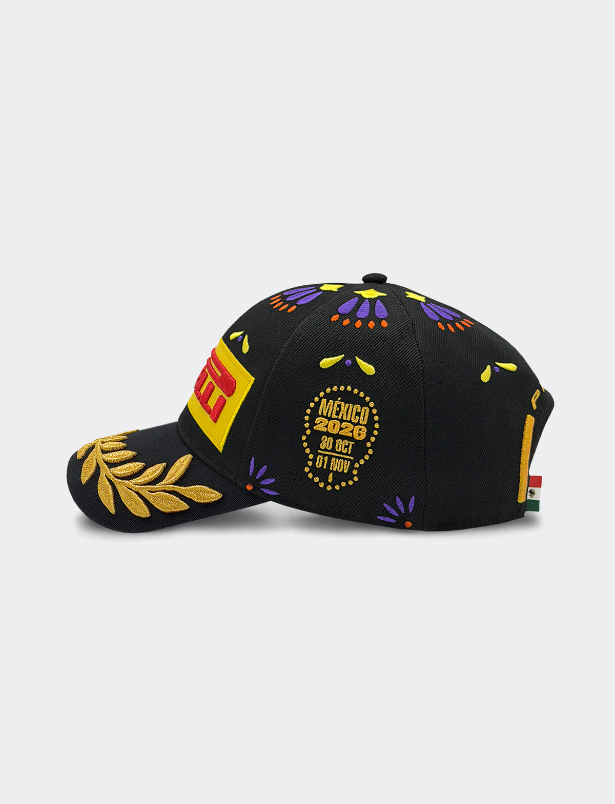 Left view of A black Pirelli Podium Cap 2026 Mexico baseball cap featuring a prominent yellow and red embroidered logo on the front, a gold laurel leaf embroidery on the brim, and multicolor geometric patterns on the crown.