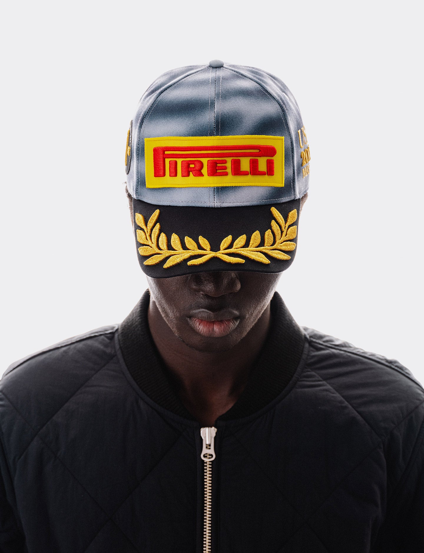 Person wearing the official Miami F1® 2026 Pirelli Podium Cap
