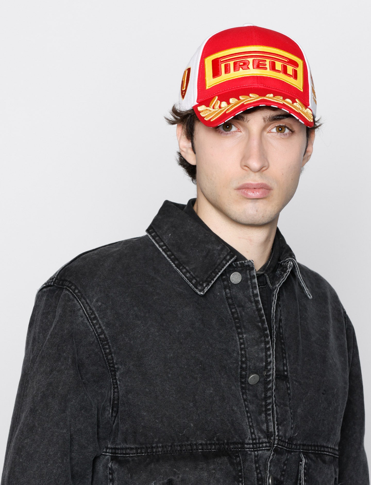 man in red & white Pirelli Podium Cap