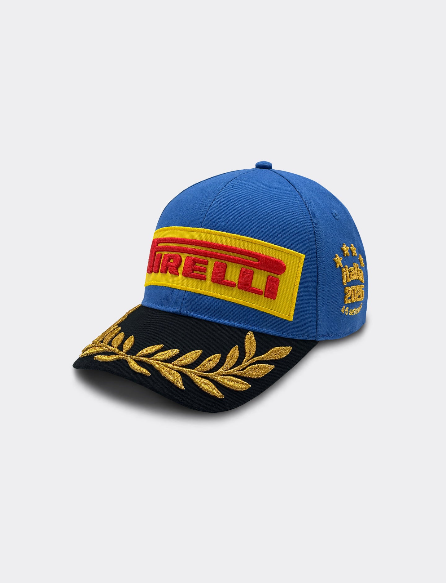 Pirelli Podium Cap 2026 Monza, left 45 degree angle view. Royal blue with black visor an gold embroidery throughout.