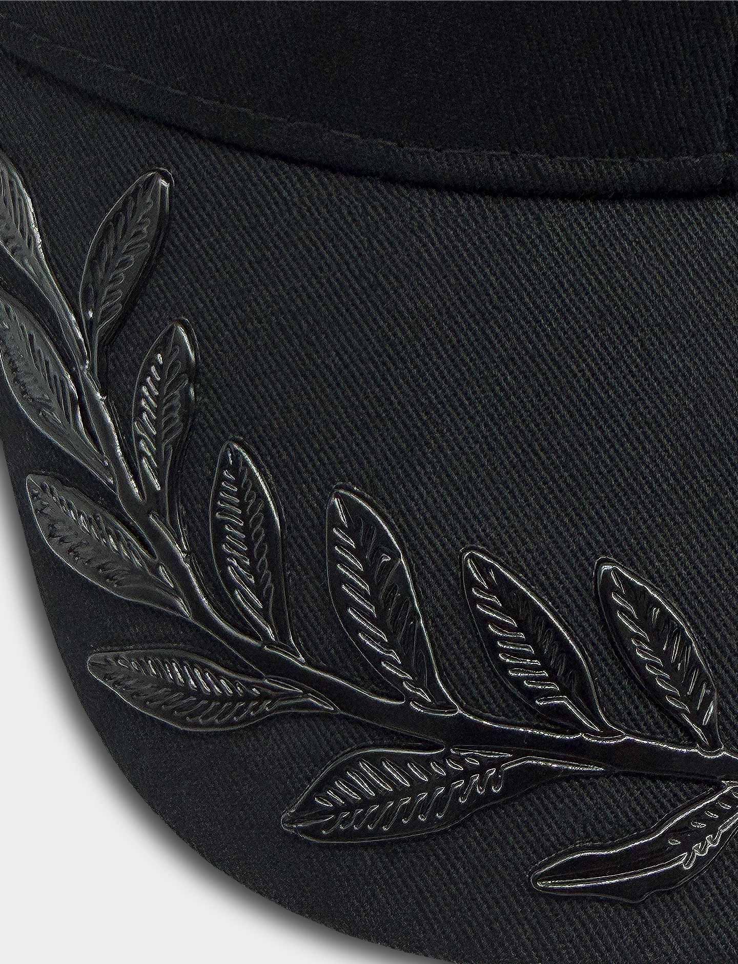 Pirelli Podium Cap - Nights Out - closeup of d glossy laurel print