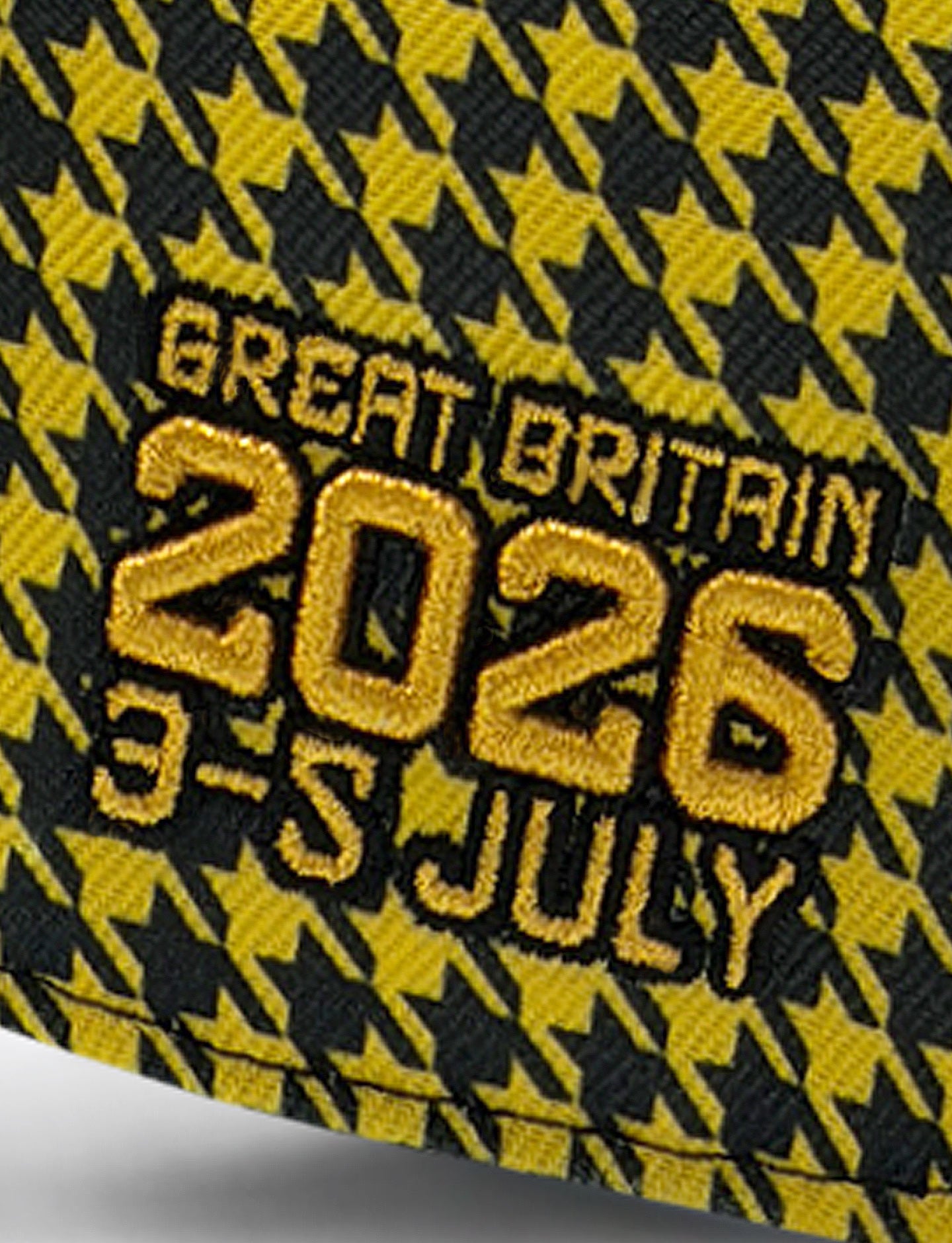 Text 'GREAT BRITAIN 2026 3-5 JULY' on a yellow and black checkered background